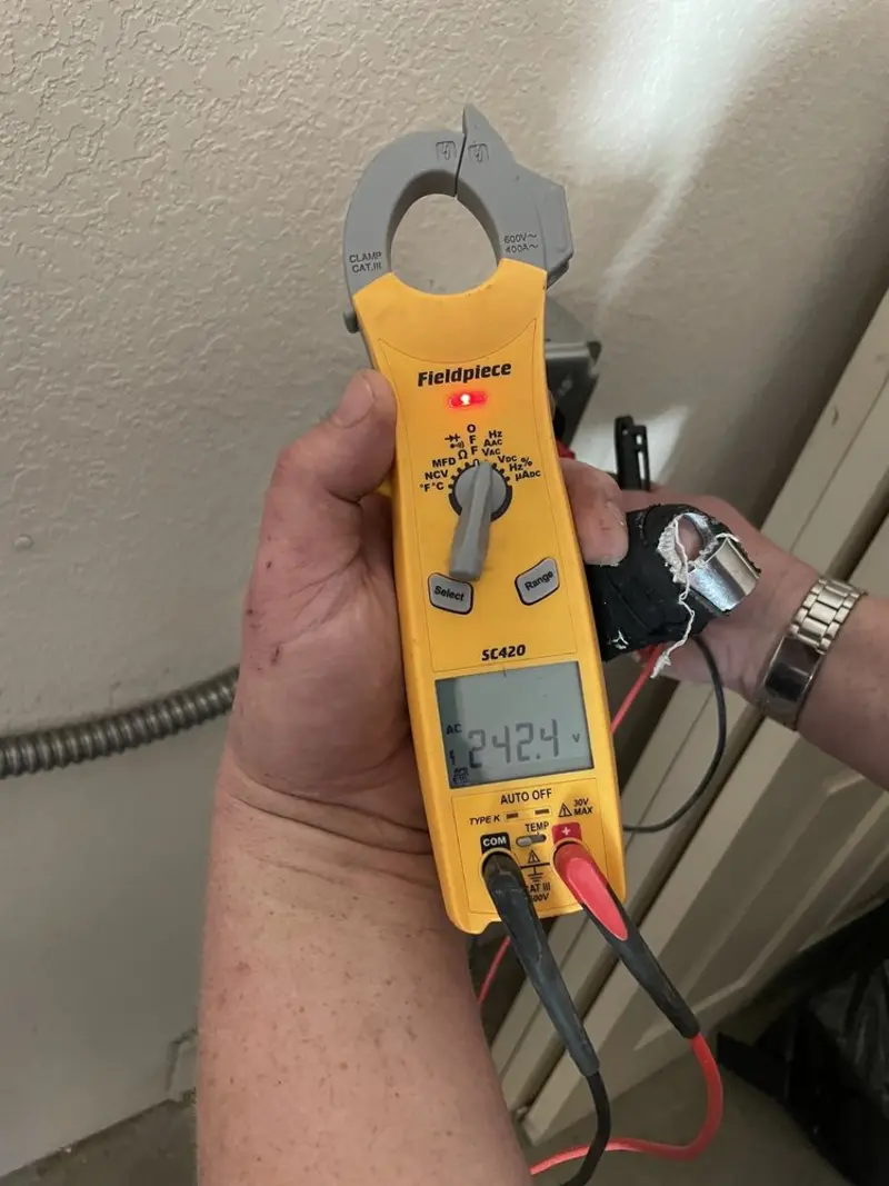 Voltage testing with clamp meter during Circuit Breaker Repair in Sorgho